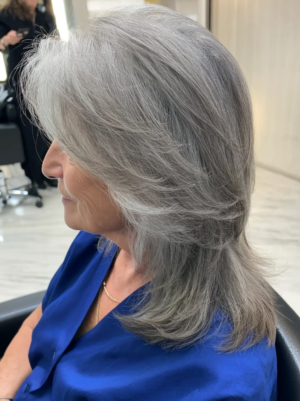 Medium Straight Feathered Layers with Side-Swept Bangs